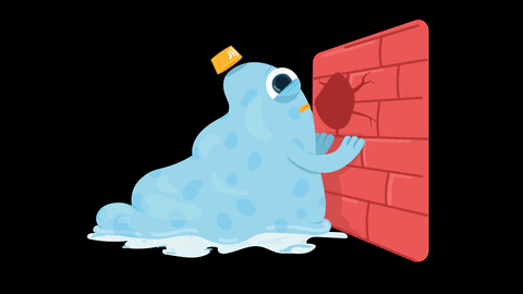 A person repeatedly banging their head against a wall